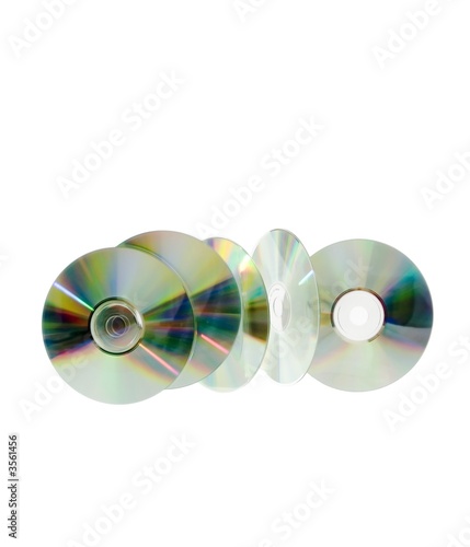 five cd's floating in the air