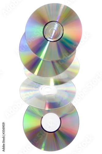 five cd's floating in the air