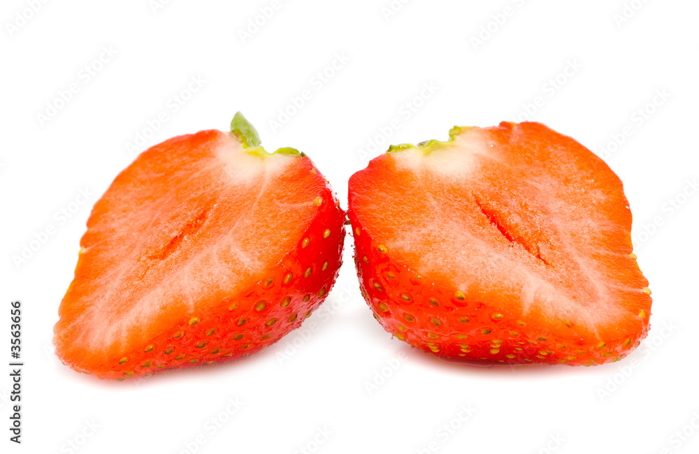 Slices of a strawberry on a white background. Slices of a strawberry on a white background.