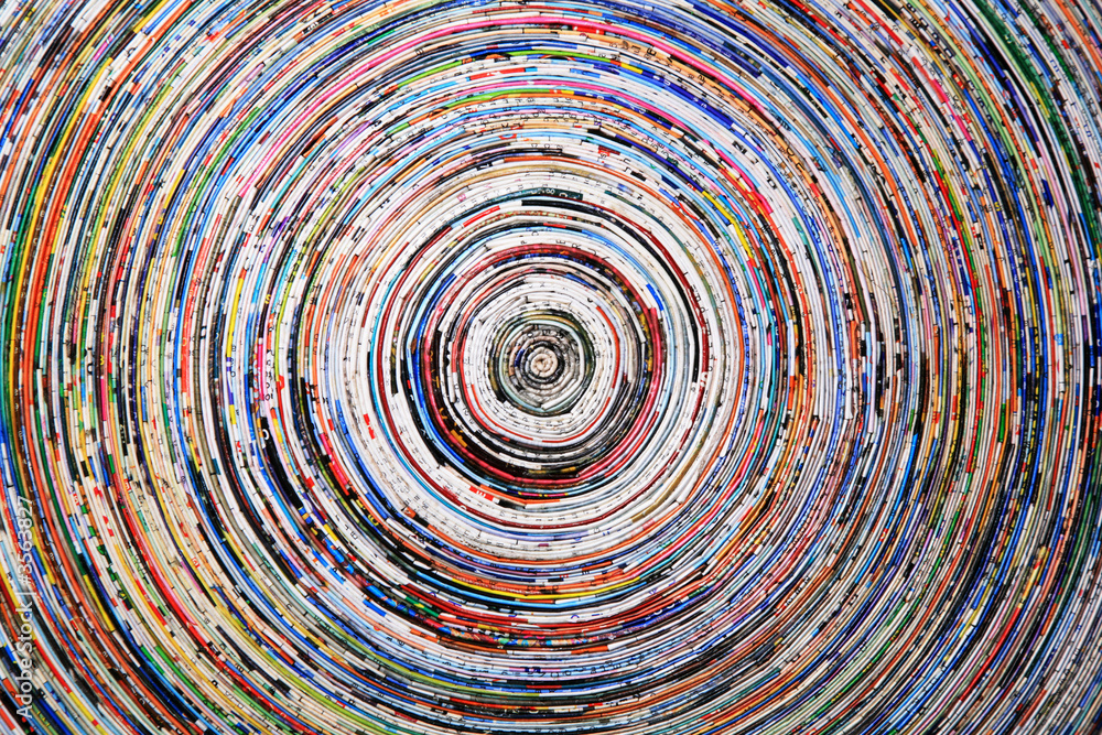 background of a colorful spiral of wrapped paper background of a colorful spiral of wrapped paper
