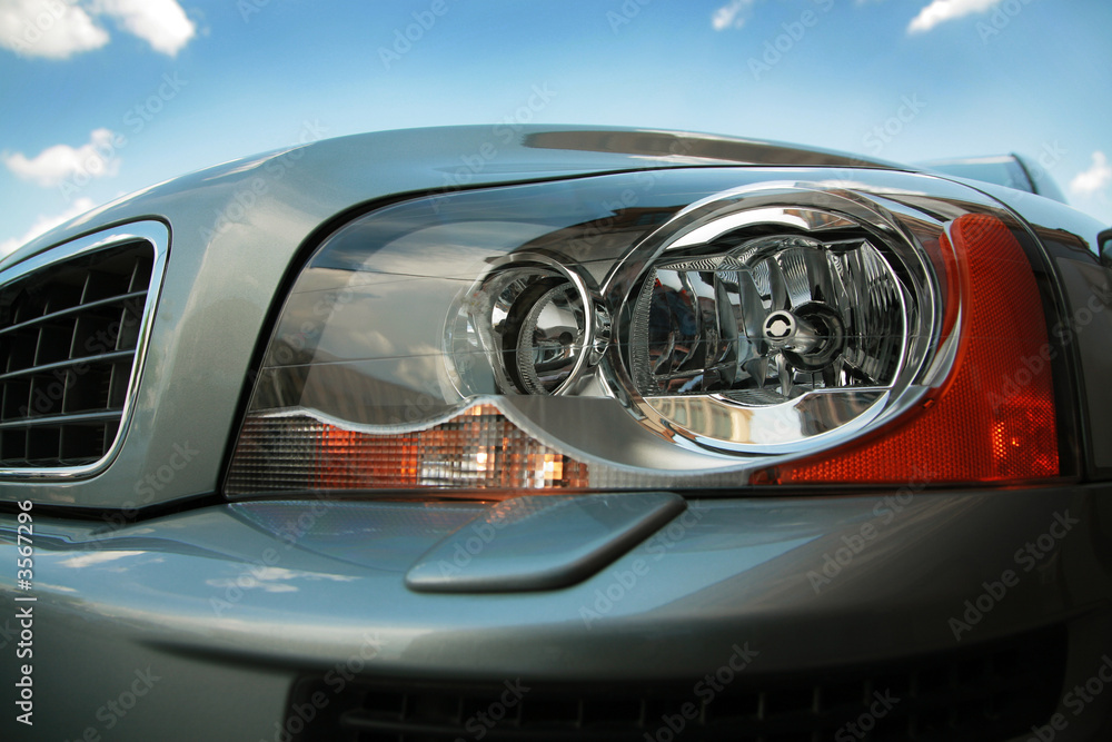 Headlight of the modern car close up