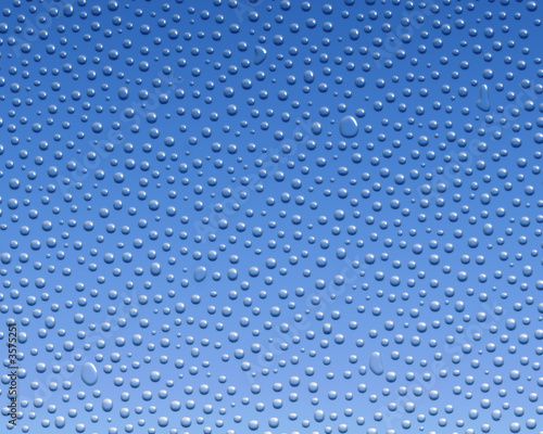 canvas print motiv - James Steidl : Water condensation formed on glass over a blue background