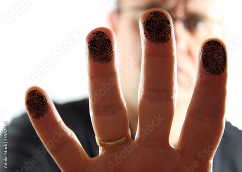 Man Presing on Glass leaving fingerprints.