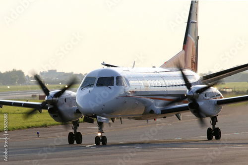 Turboprop airplane on taxiway