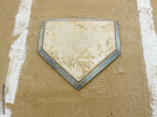Photography Close-up of home plate on a municipal baseball diamond