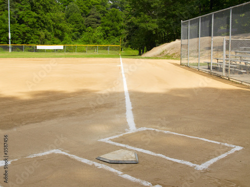 Photography Home plate and first base foul line on a small-town ball diamond