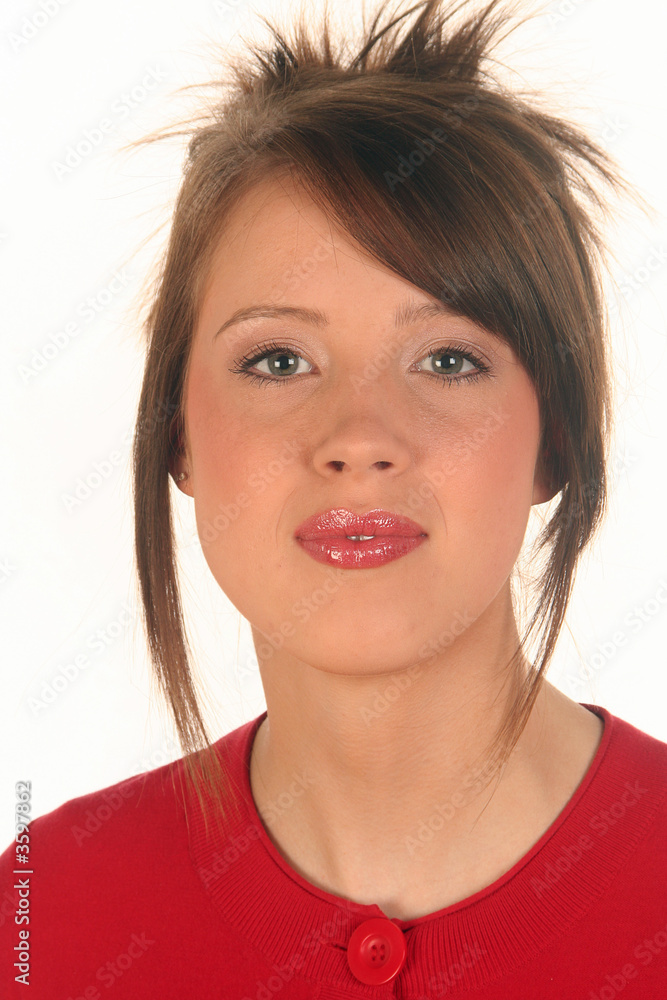 Attractive woman in red looking at camera. Attractive woman in red looking at camera.