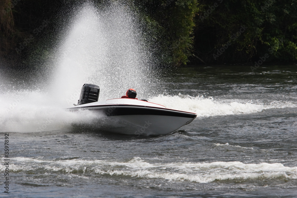 Fototapeta premium A speed boat on the river