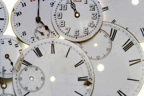 Old cracked and dirty watch faces