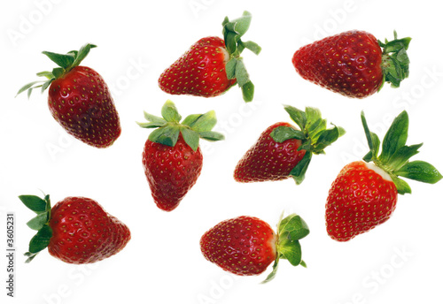 Fresh and tasty strawberries reflected on white background