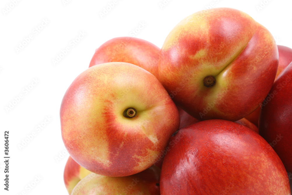pile of fresh and delicious nectarines isolated on white pile of fresh and delicious nectarines isolated on white