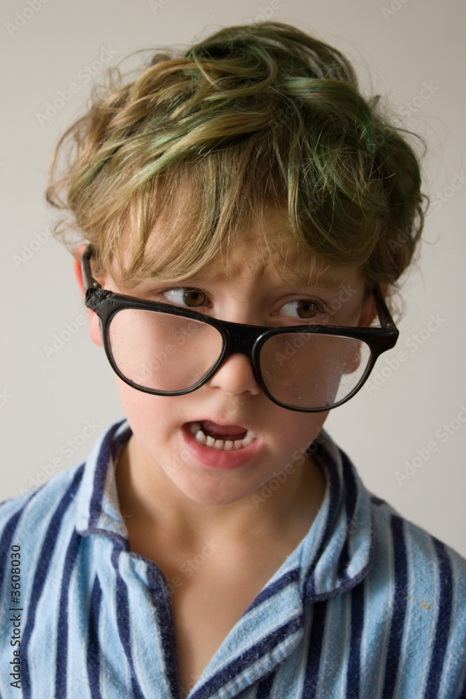 Young male boy hanging around in his pyjamas for the day.