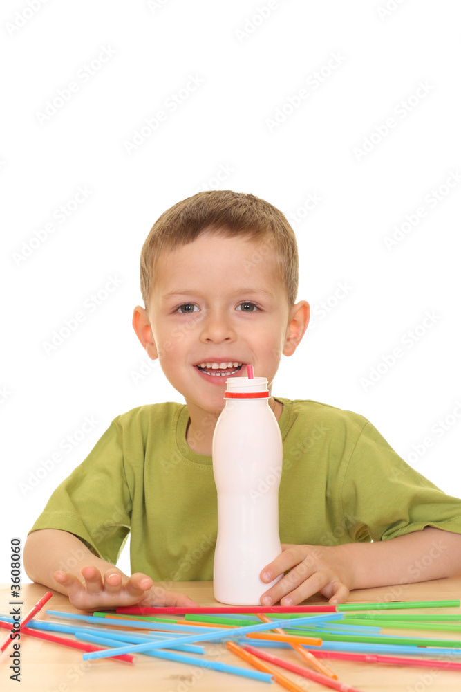 five years old boy drinking milk isolated on white five years old boy drinking milk isolated on white