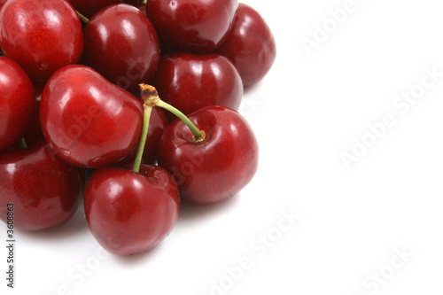 pile of delicious cherries isolated on white