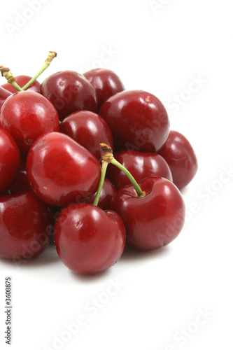 pile of delicious cherries isolated on white