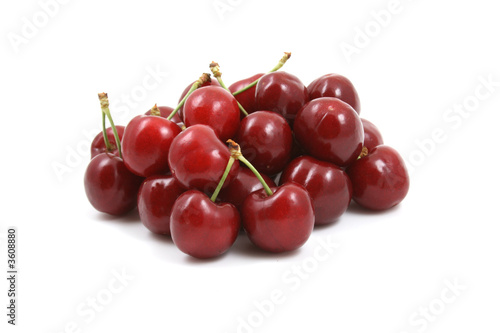 pile of delicious cherries isolated on white