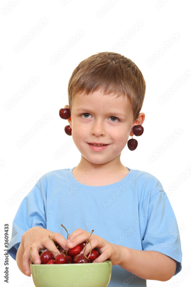 five years old boy and fresh cherries isolated on white five years old boy and fresh cherries isolated on white