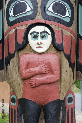 Alaskan totem pole of Saxman Nature Village photo