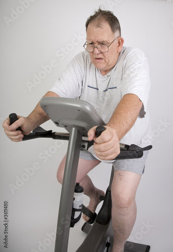 Big Guy working out on an excercise bike