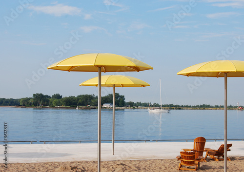 Boat passes beach chairs