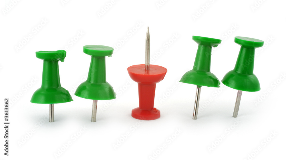 red thumbtack in upside-down position opposed to green ones red thumbtack in upside-down position opposed to green ones