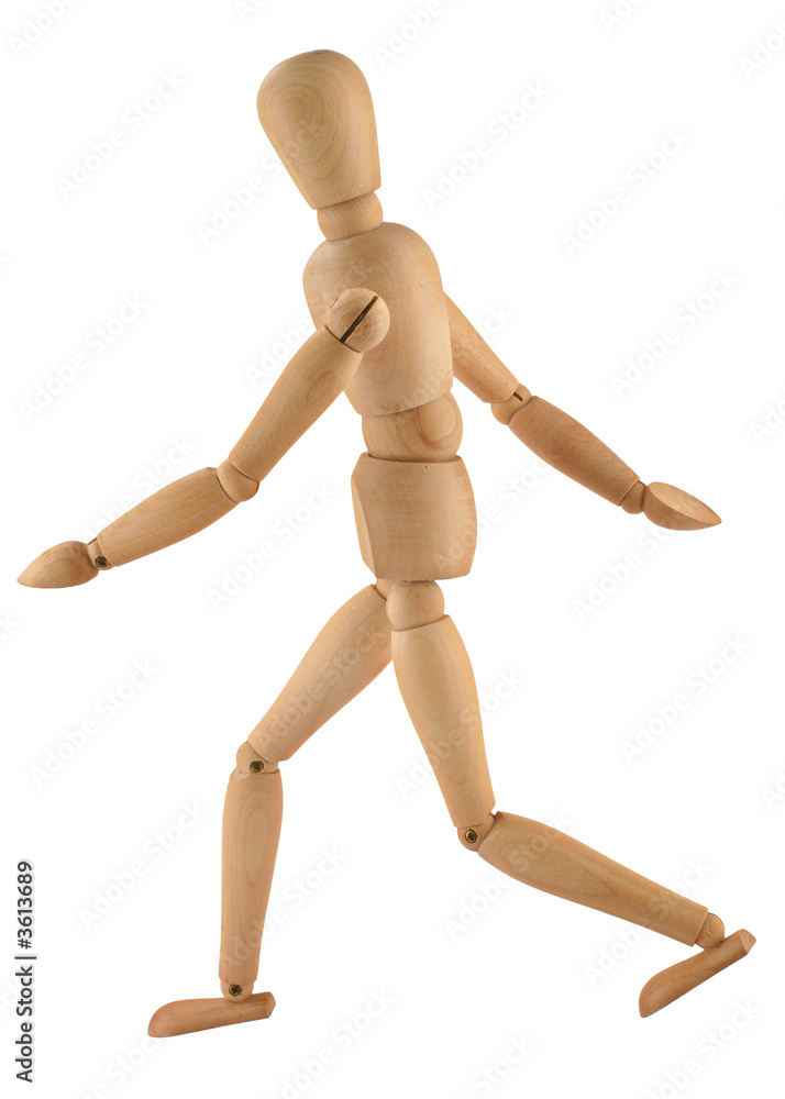 close-up of a running wooden figure isolated on white close-up of a running wooden figure isolated on white