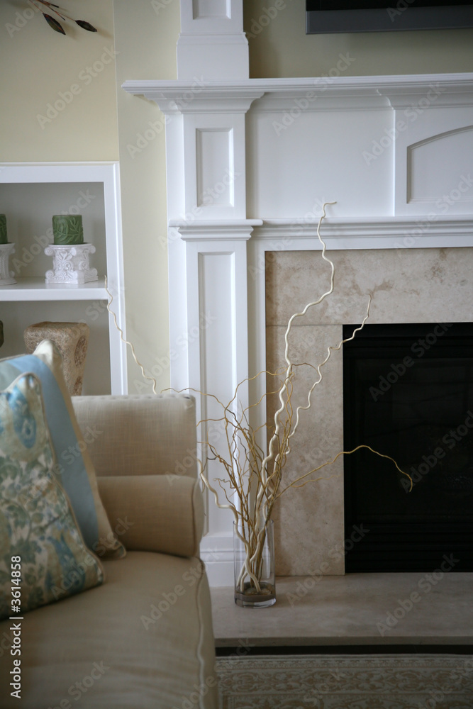 Modern fireplace corner in a cozy home, neutral colors Modern fireplace corner in a cozy home, neutral colors