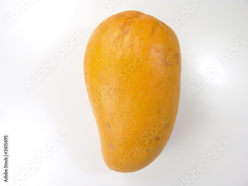 Yellow sweet juicy champagne mango close-up