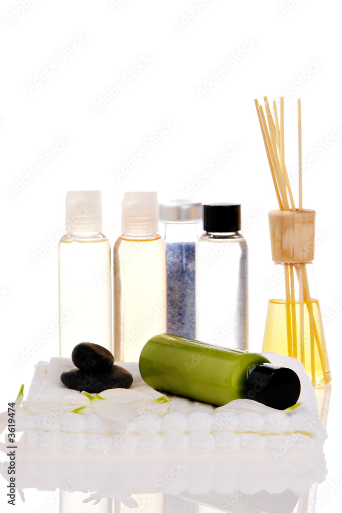 Spa bottles on white background