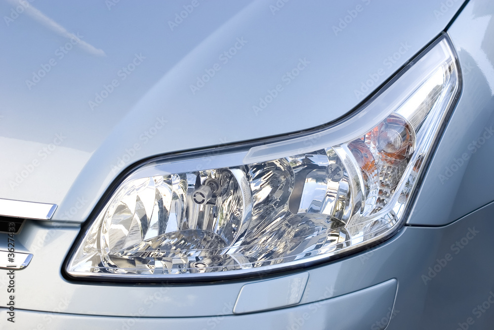 Headlight of modern elegant vehicle, close-up shot.