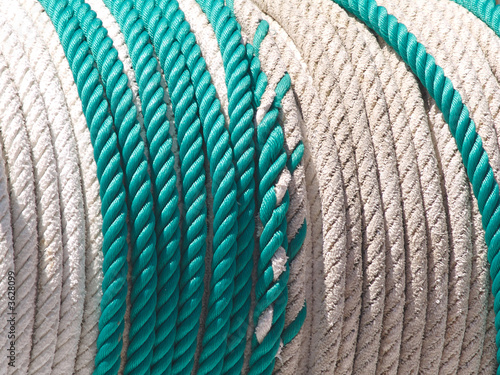 Green and white rope on a drum