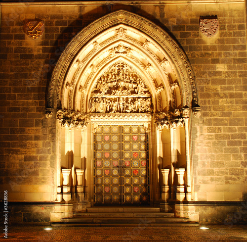 Illuminated portal of a czech cathedral on Vysehrad in the night photo