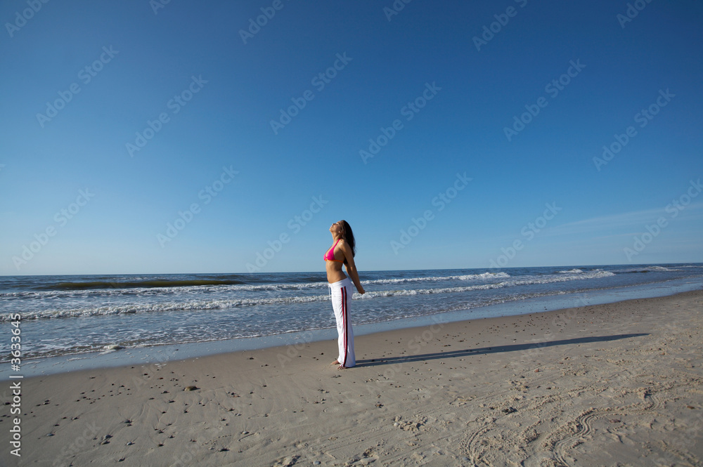 20-25 years old Beautiful Woman on the beach, during jogging