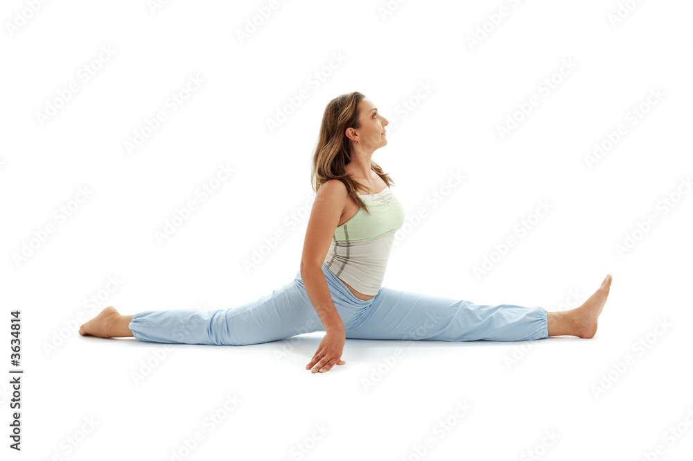 sporty girl practicing hanumanasana monkey pose over white