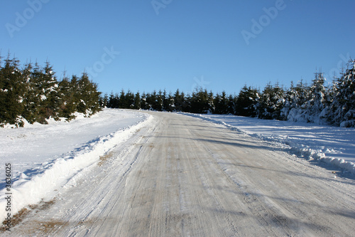 winter road covered in snow