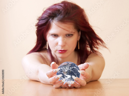 The girl holding globe