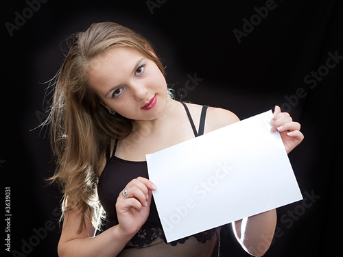 Girl hold a sheet of paper