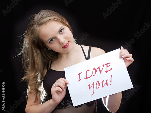 Girl hold a sheet of paper
