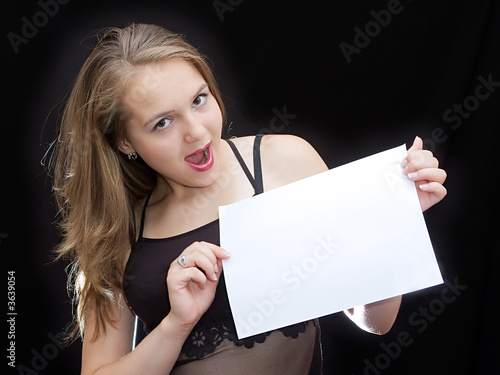 Girl hold a sheet of paper
