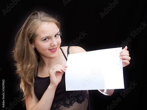Girl hold a sheet of paper
