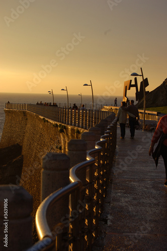 Paseo Nuevo in San Sebastian at sunset. Spain photo