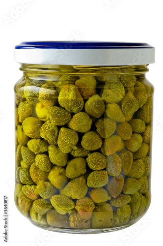 Glass jar of preserved capers with clipping path