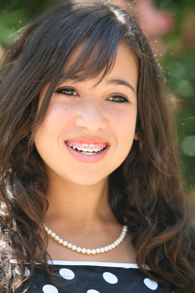 Happy asian teenage girl with a necklace Happy asian teenage girl with a necklace