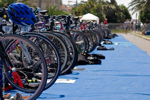 Group of Bikes' wheels in a row in a triathlon competition.