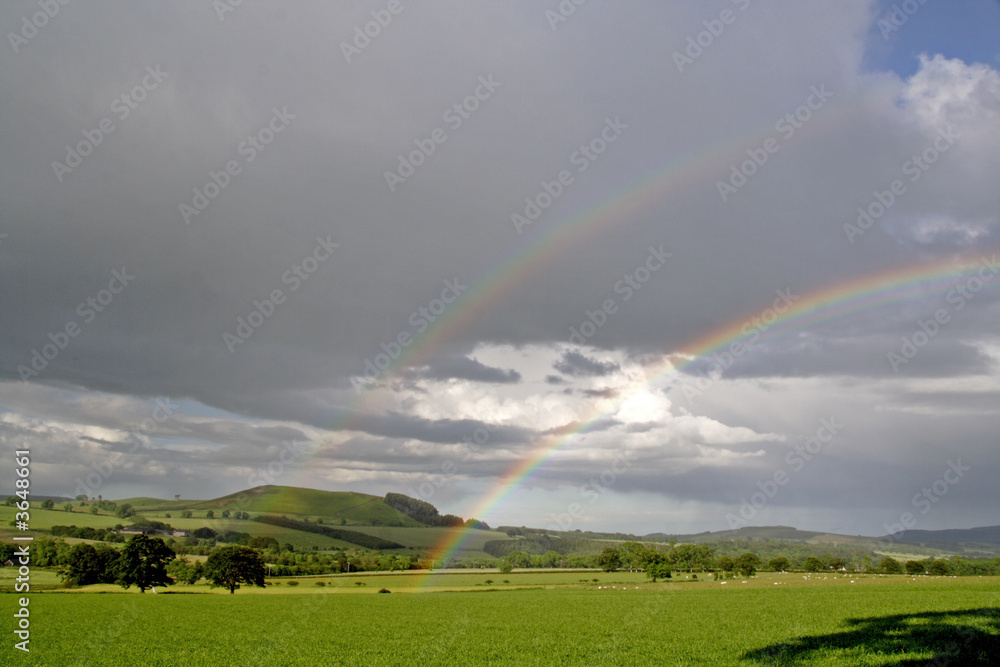 rainbows and rain clouds rainbows and rain clouds