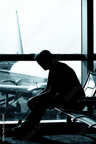 Woman Waiting in Airport (Urban-Toned Silhouette)