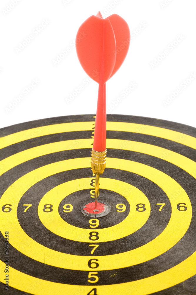 a dart on a dartboard, concept of success a dart on a dartboard, concept of success