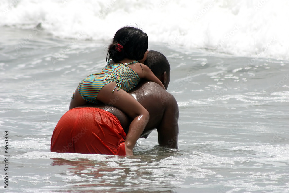 Father and daughter in the ocean Father and daughter in the ocean