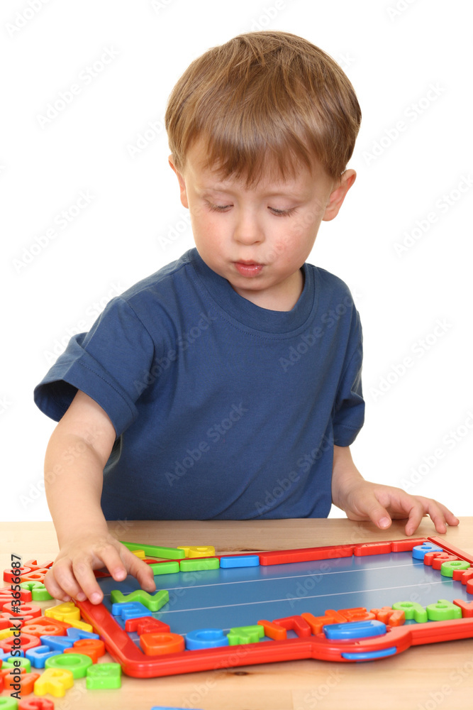 three years old boy and letters isolated on white three years old boy and letters isolated on white