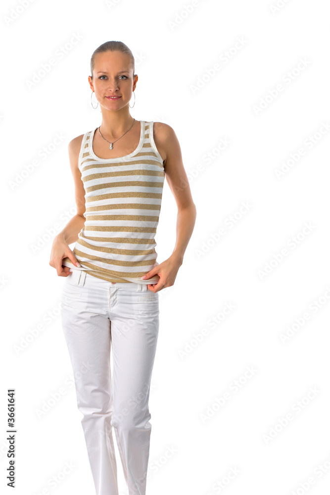 trendy beautiful girl in golden striped t-shirt and white pants trendy beautiful girl in golden striped t-shirt and white pants